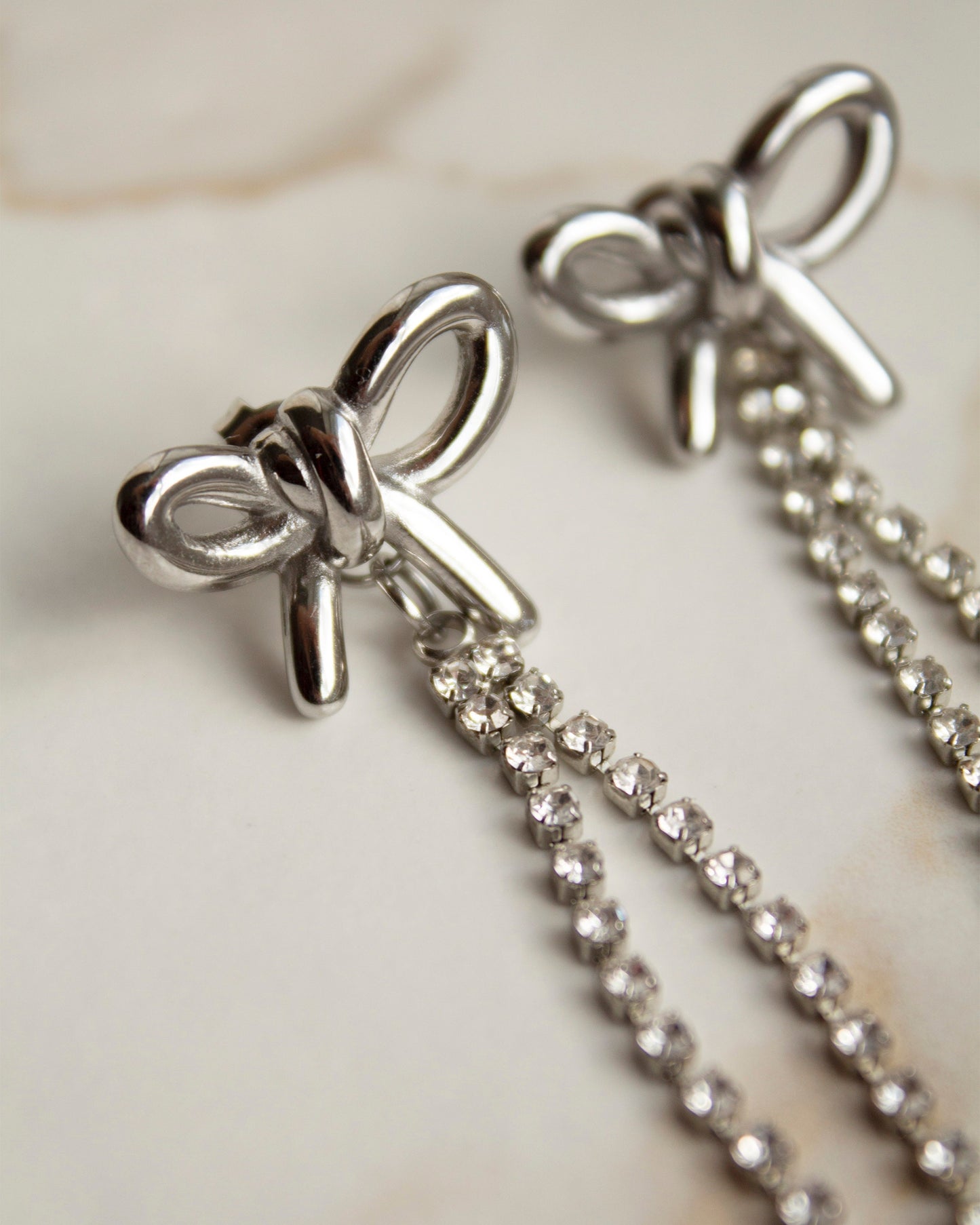 Delphine Silver Bow Stud Earrings